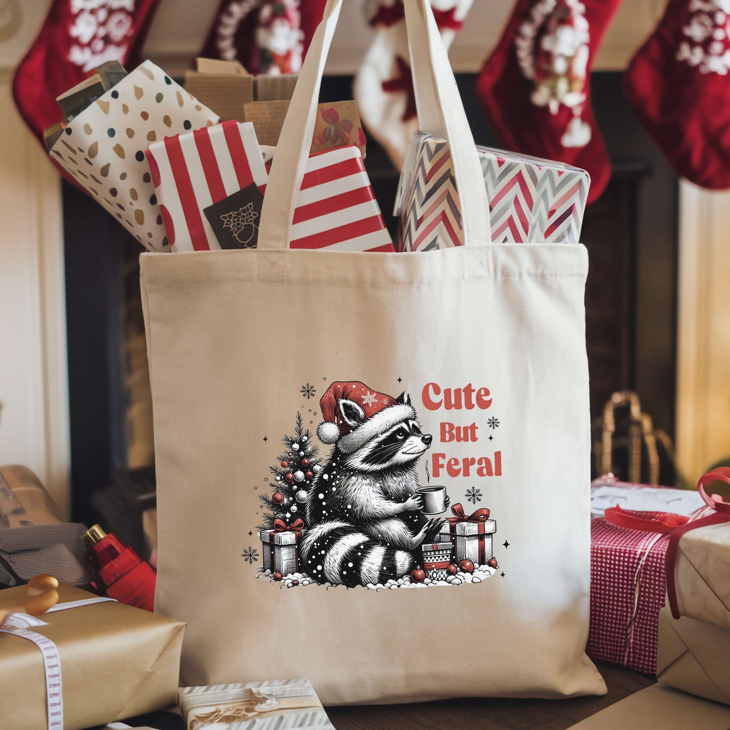 Canvas Tote Bag Feral But Cute Christmas racoon graphic indoor view with presents