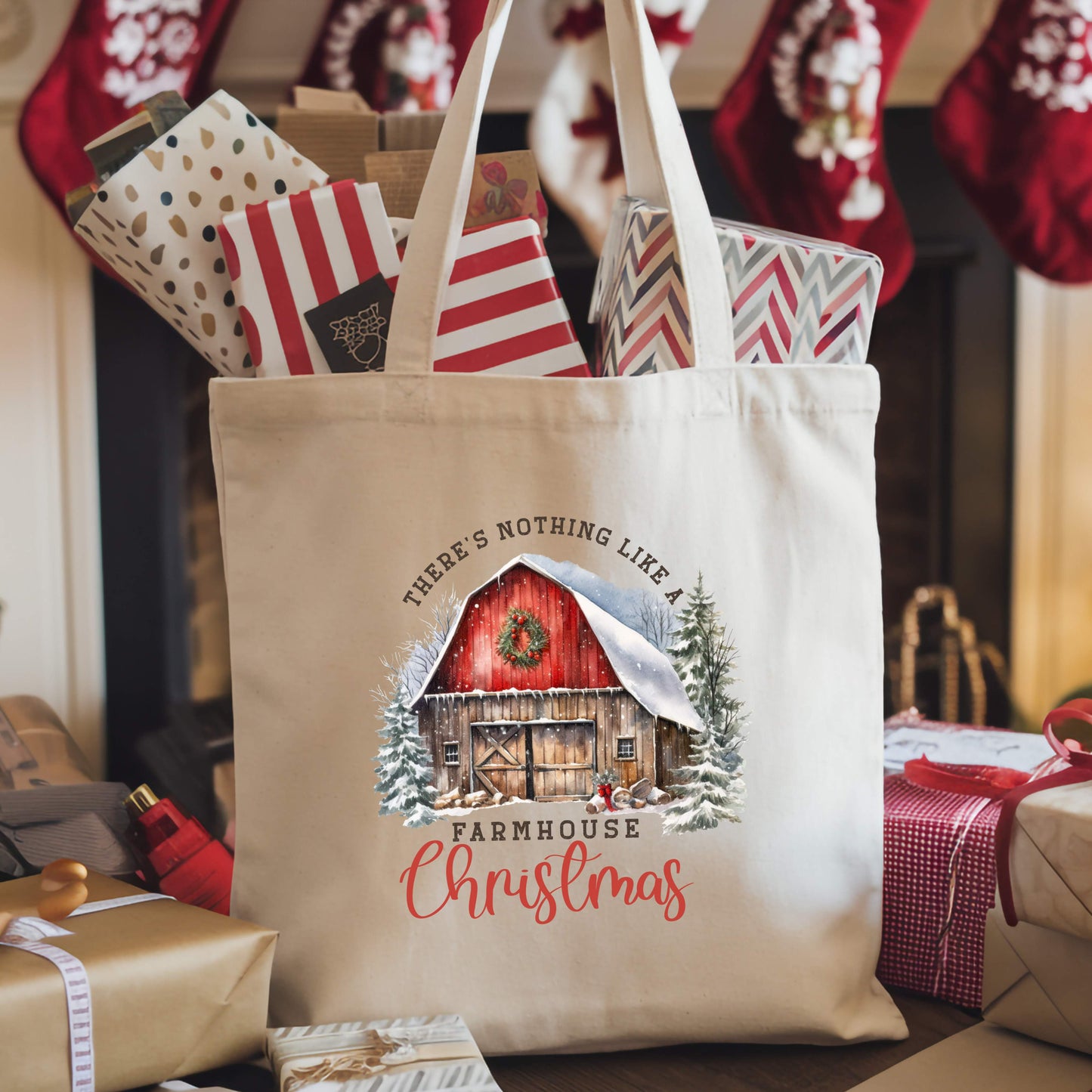 Canvas tote bag with a rustic red barn and the phrase “There’s Nothing Like a Farmhouse Christmas.”