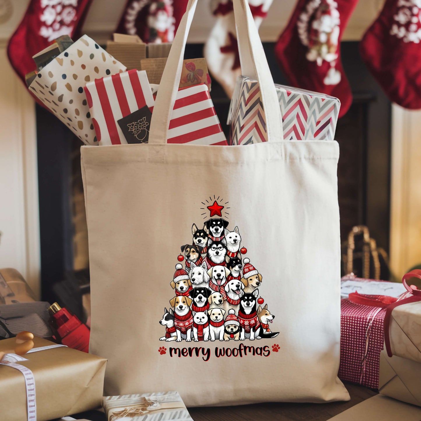 Canvas tote bag with a holiday design featuring a tree made of dogs and the words “Merry Woofmas.”