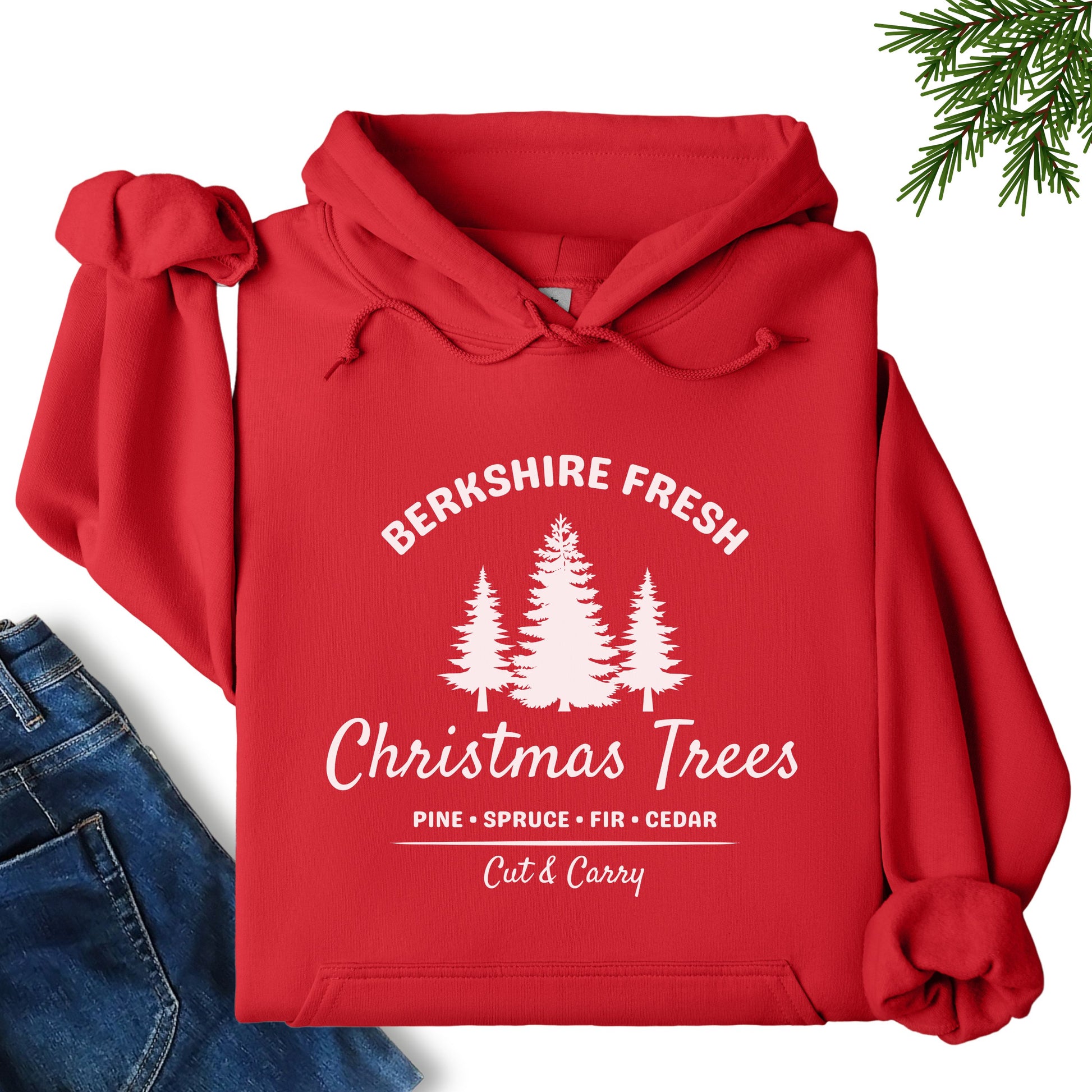 Berkshire Fresh Christmas Trees hoodie in red laid flat showing festive tree farm graphic on the front
