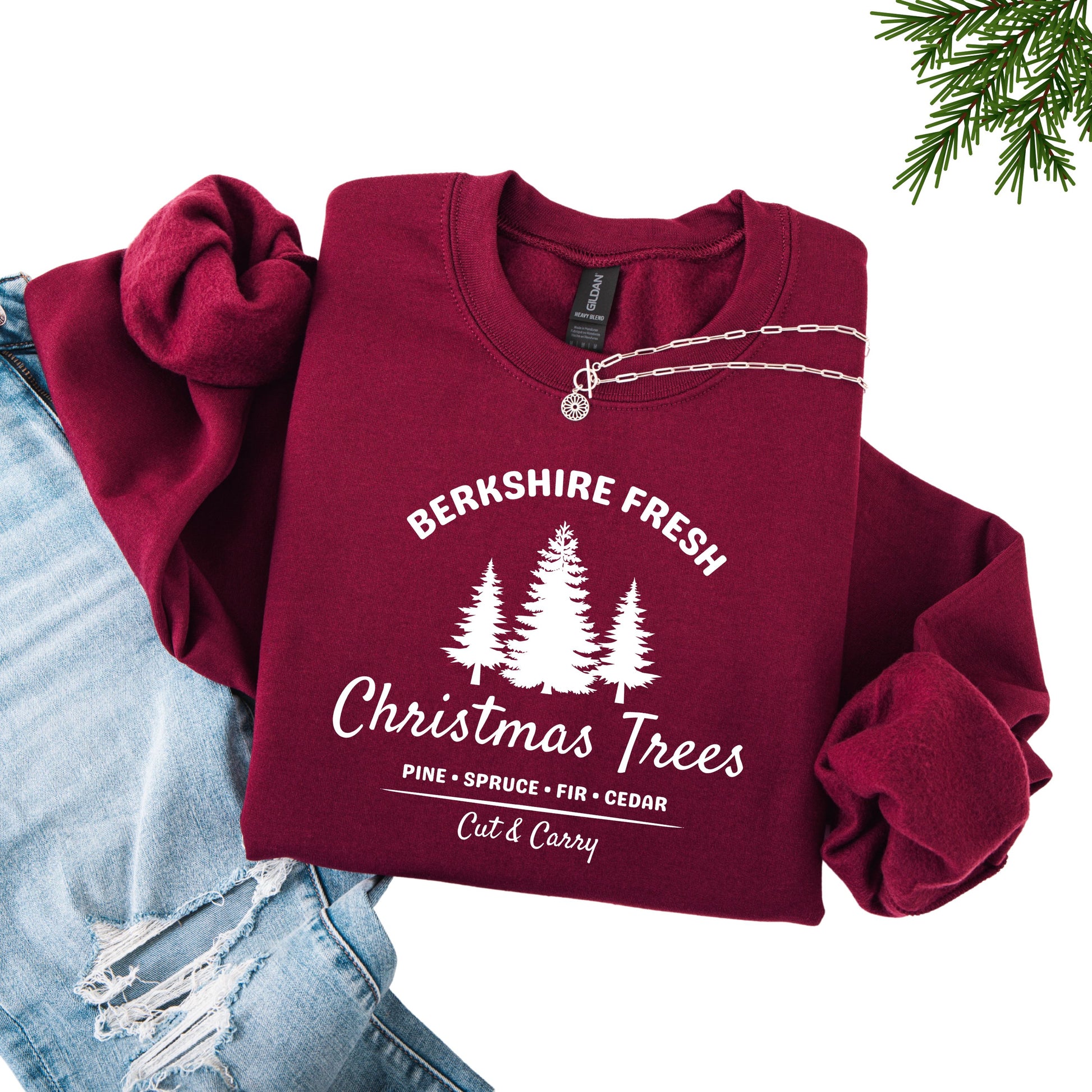 Maroon sweatshirt with 'Berkshire Fresh Christmas Trees' white text and trees graphic.