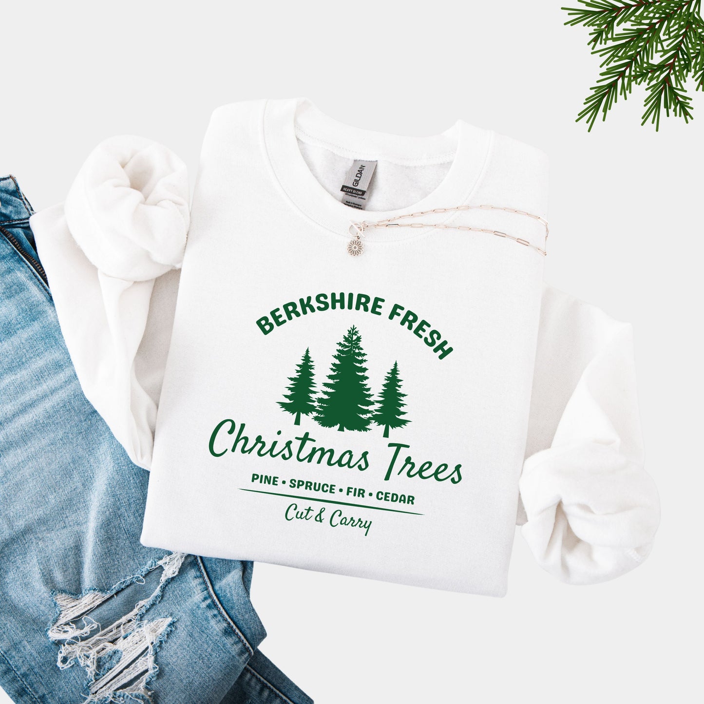White sweatshirt with "Berkshire Fresh Christmas Trees" green text and tree graphic.