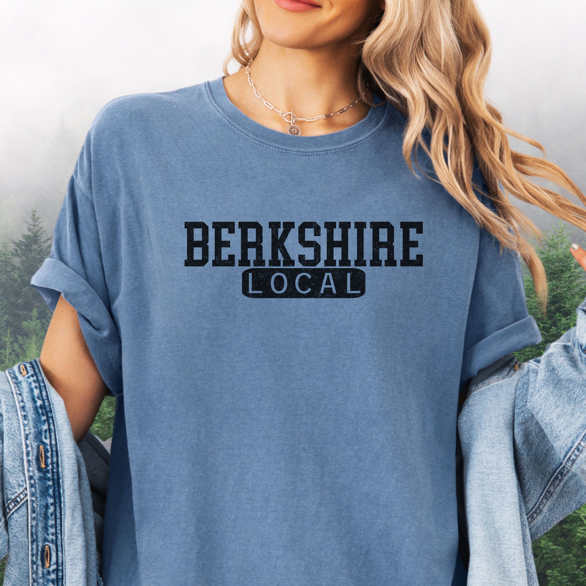 Person wearing Berkshire Local vintage distressed graphic on a Blue Jean Comfort Colors t shirt