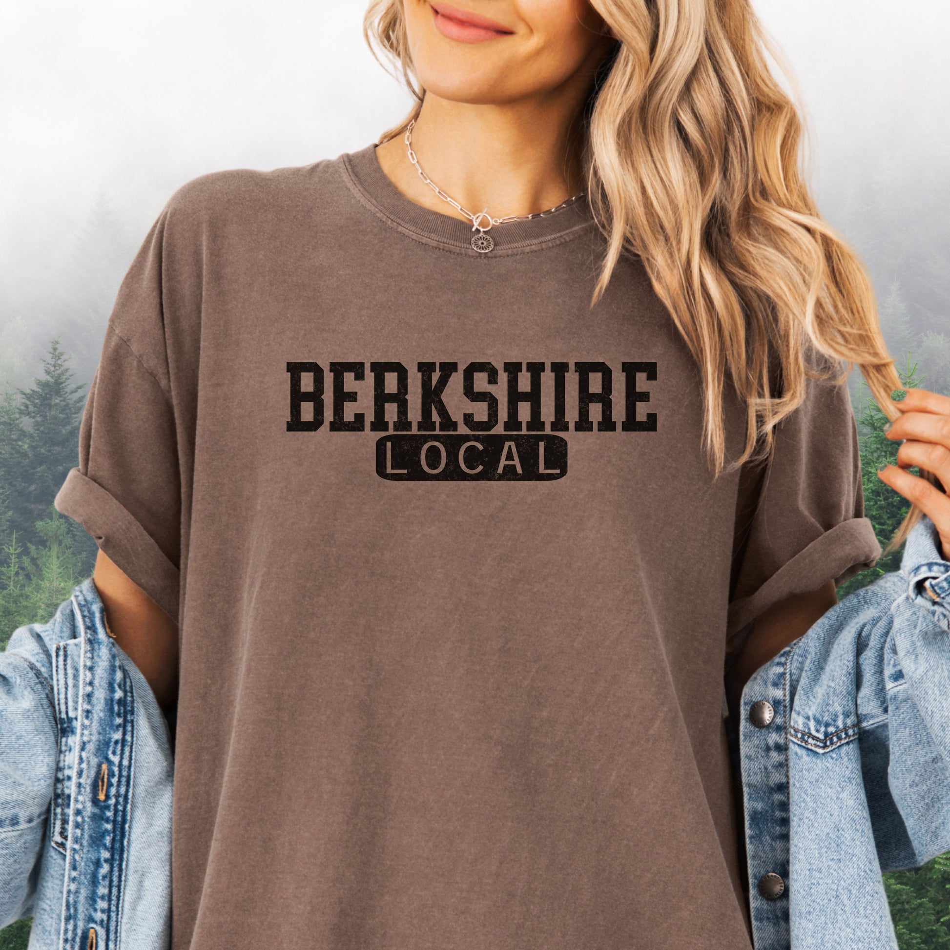 Person wearing Berkshire Local vintage distressed graphic on a expresso Comfort Colors t shirt