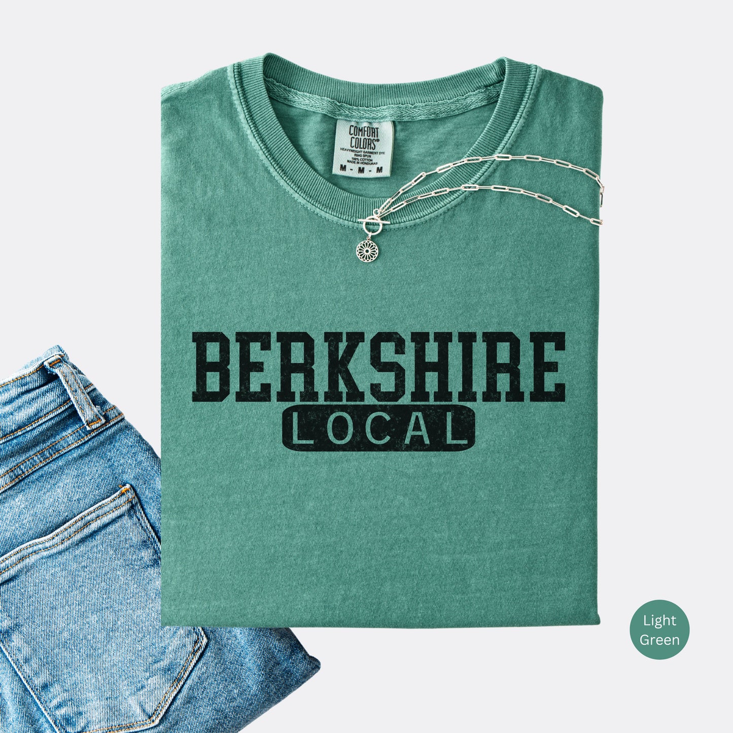 Berkshire Local vintage distressed graphic on a light green Comfort Colors t shirt
