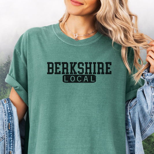 Person wearing Berkshire Local vintage distressed graphic on a light green Comfort Colors t shirt
