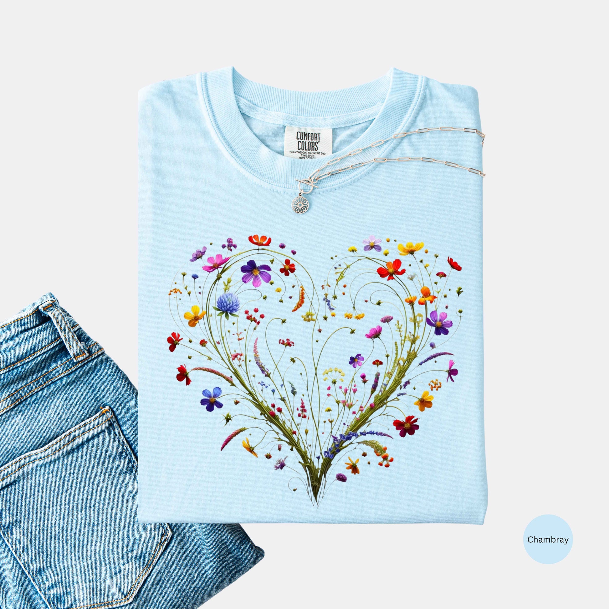 Chambray colored shirt with a wildflower heart graphic