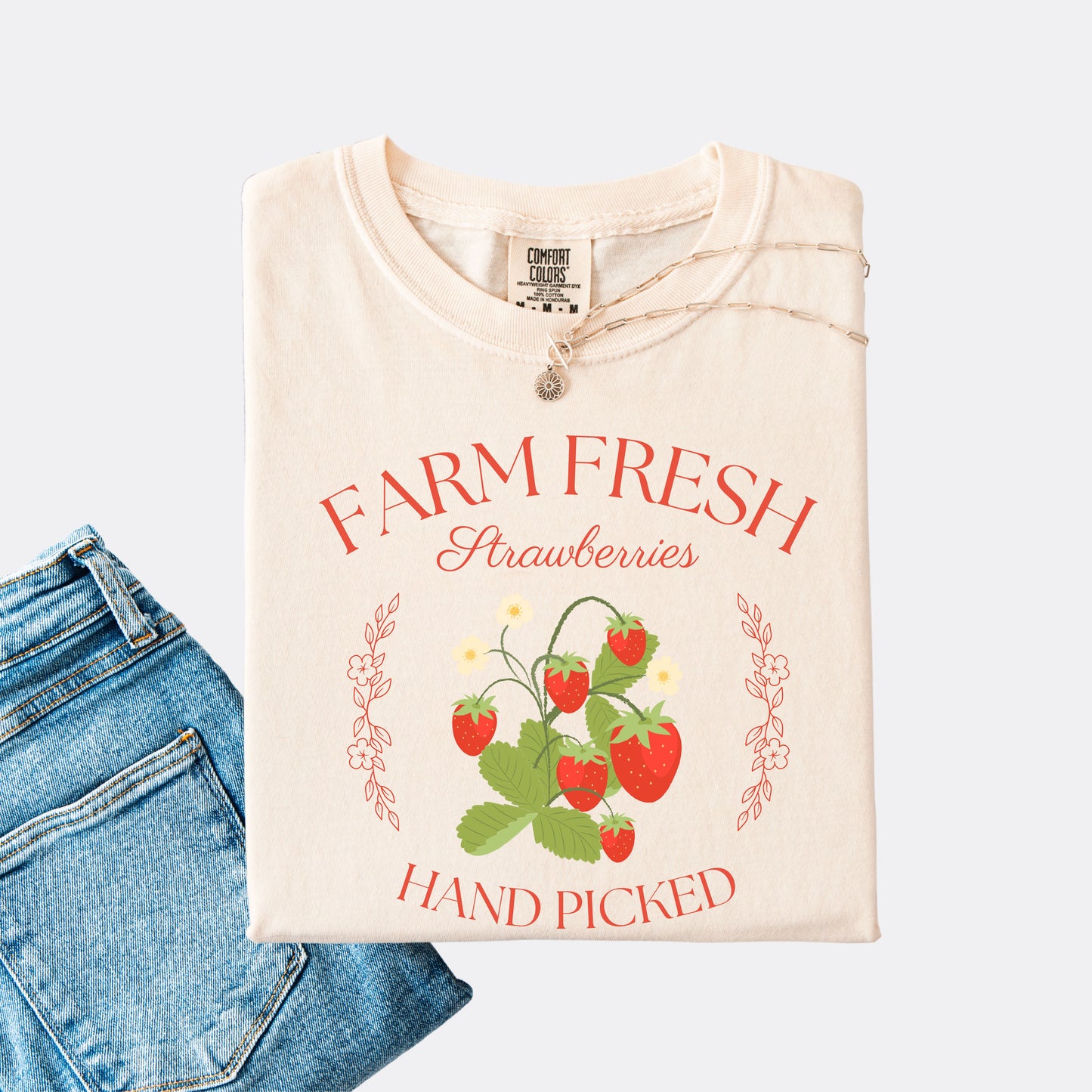 Comfort Colors shirt in ivory with a vintage style farm fresh strawberries hand picked design.