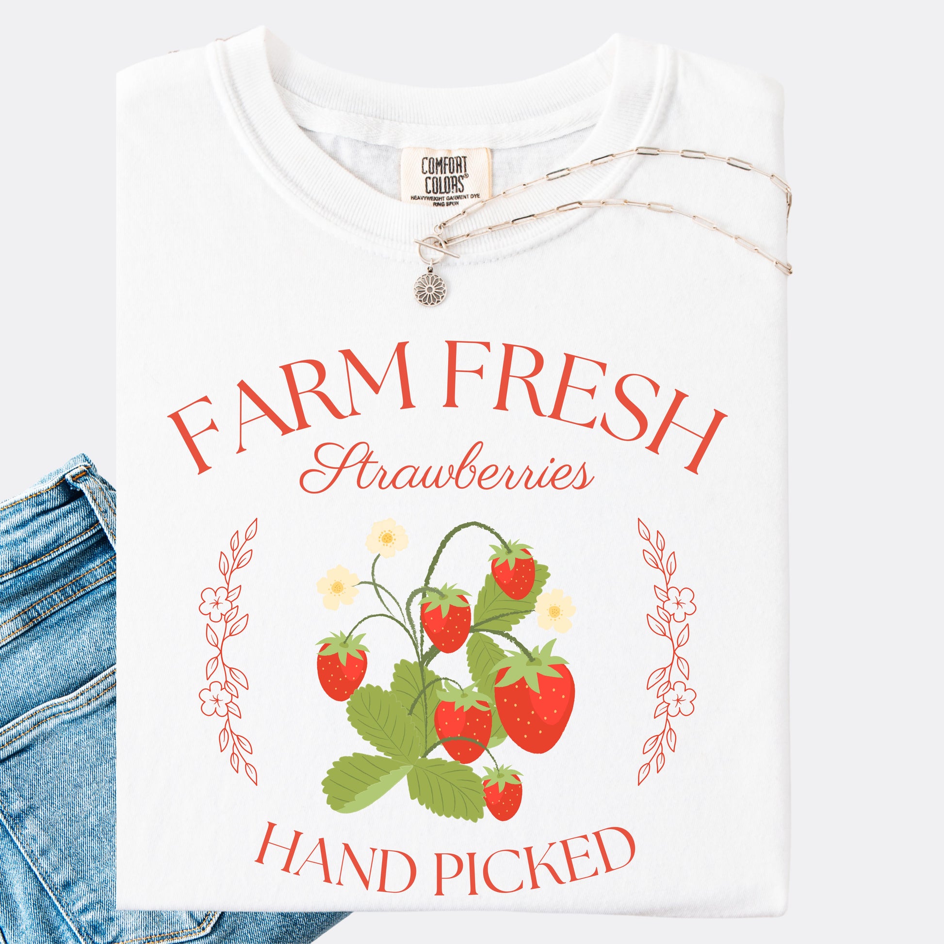 Comfort Colors shirt in white with a vintage style farm fresh strawberries hand picked design.