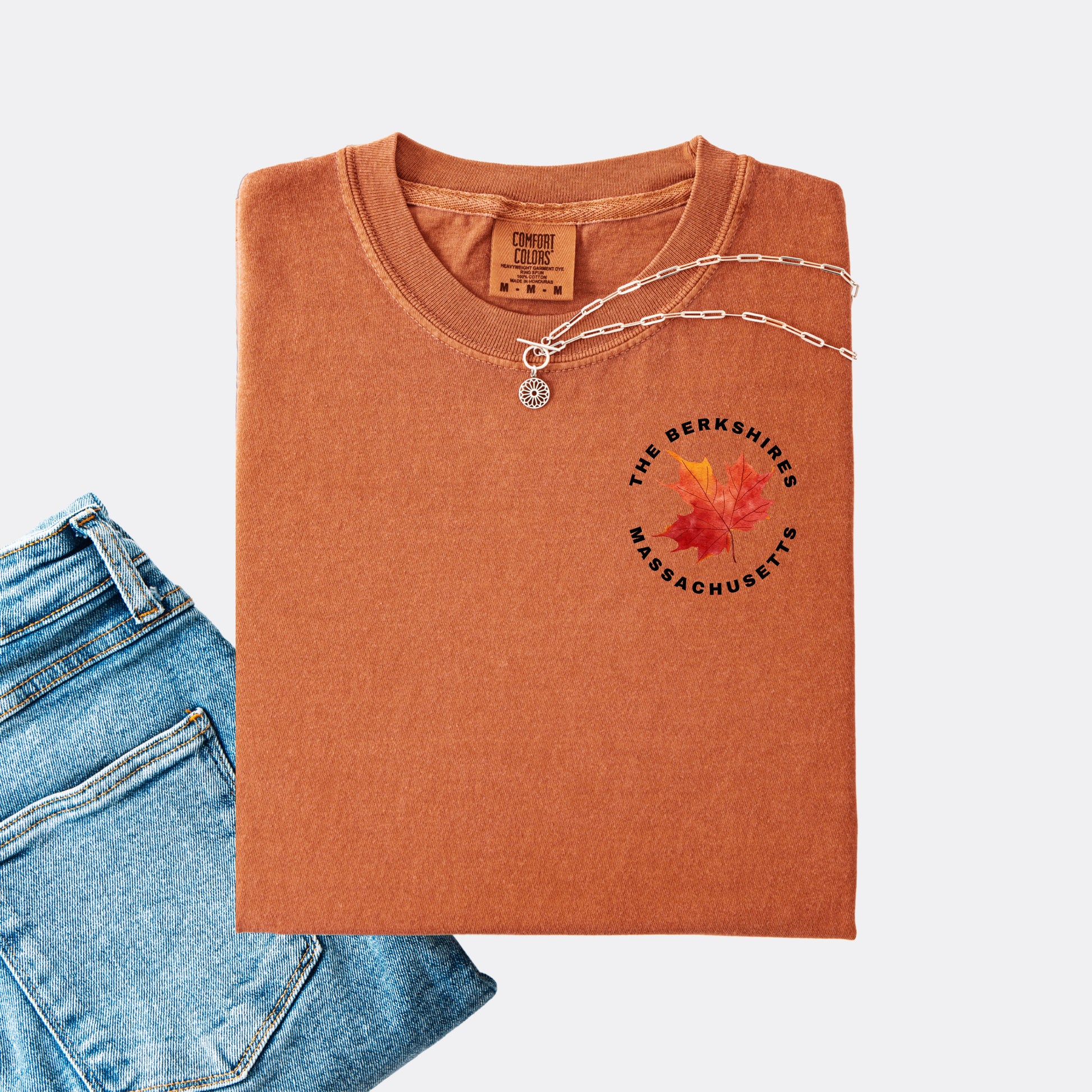Comfort Colors T-shirt in the color yam. The front chest design features a red maple leaf with text reading ‘The Berkshires Massachusetts.’”