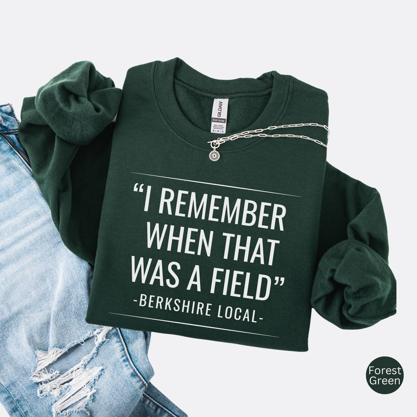 Sweatshirt with the quote "I remember when that was a field" -Berkshire Local-, in the color forest green