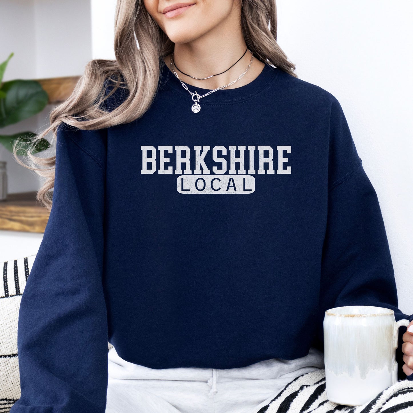 Person wearing Berkshire Local vintage distressed Massachusetts crewneck sweatshirt in the color navy