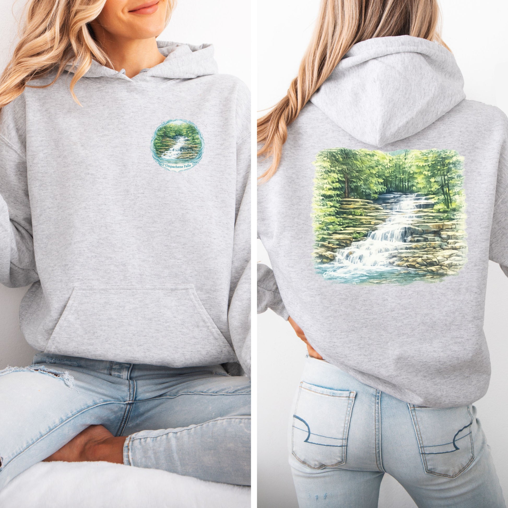 Person wearing ash colored hoodie with waterfall logo on front and full waterfall graphic on back