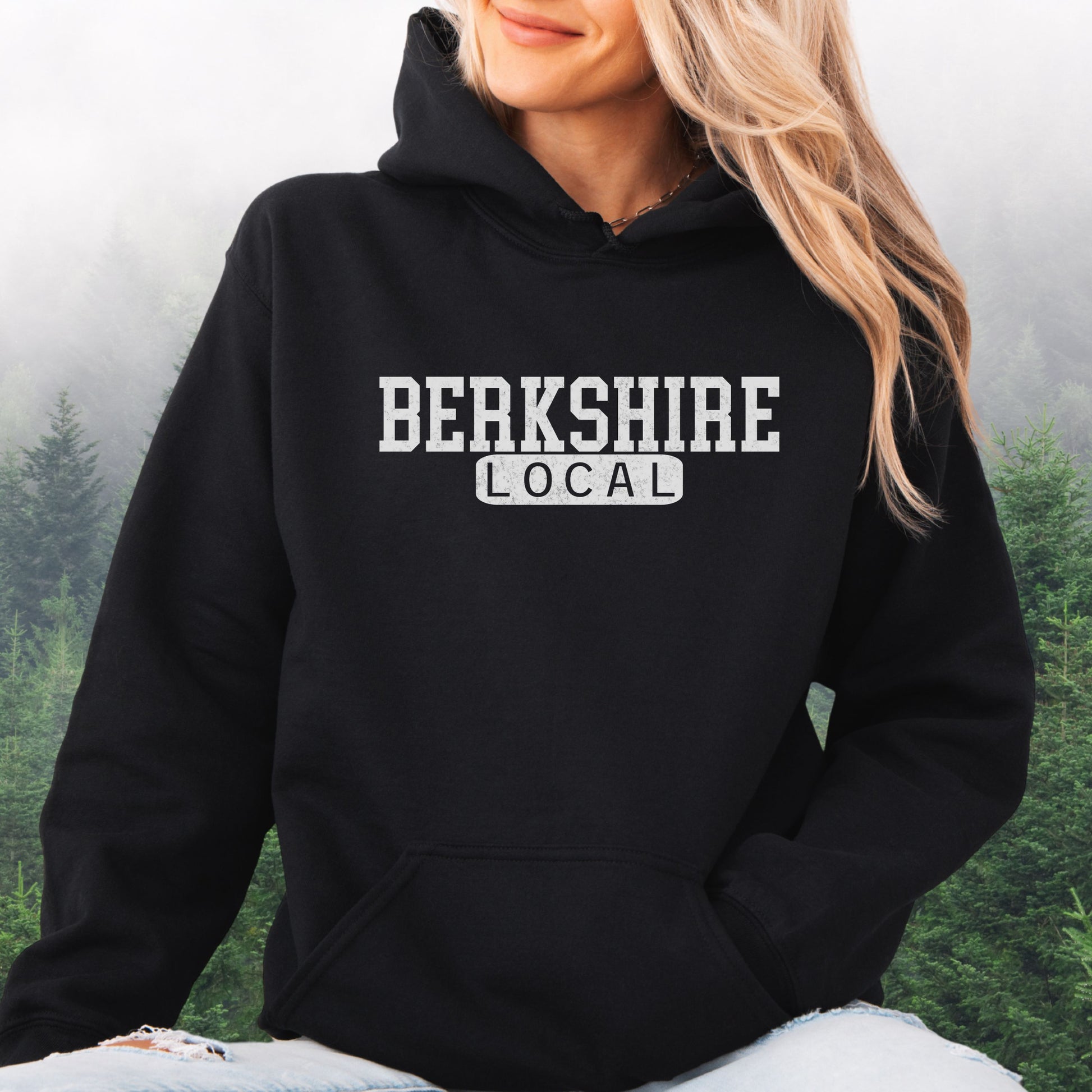 Person wearing Berkshire Local vintage distressed Massachusetts hoodie with collegiate lettering, black