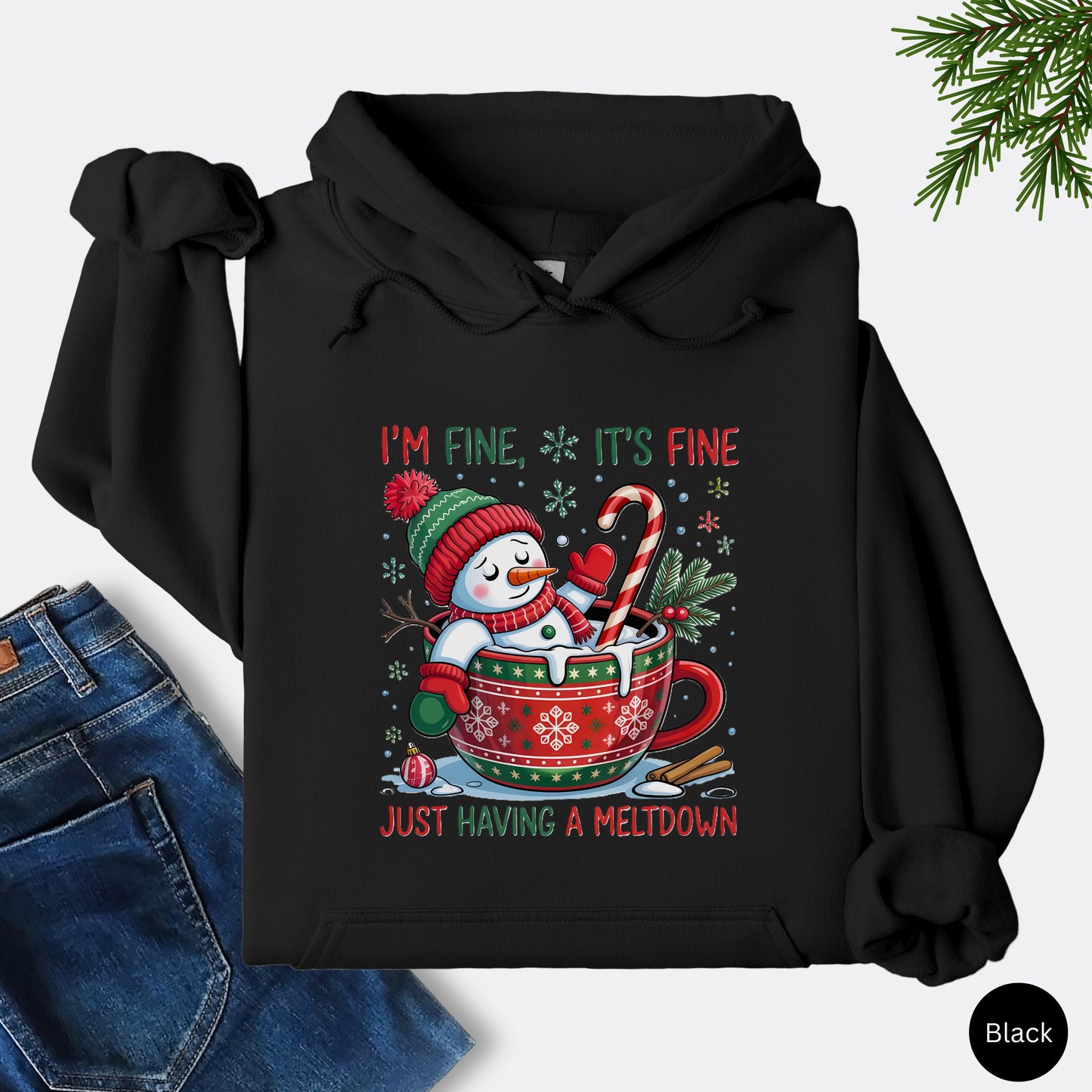 Snowman Christmas hoodie in black with festive mug design and text that reads I’m Fine It’s Fine Just Having a Meltdown.