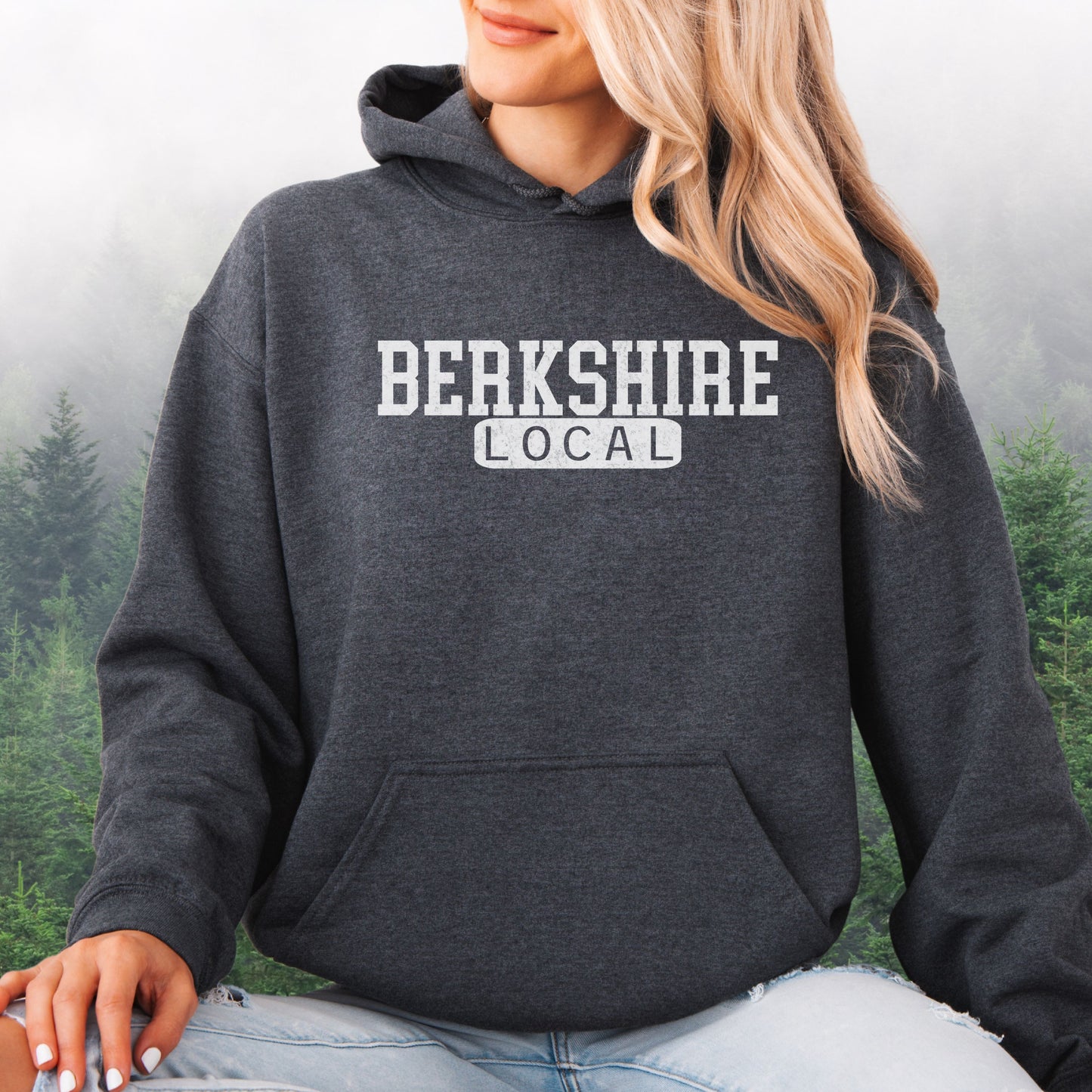 Person wearing Berkshire Local vintage distressed Massachusetts hoodie with collegiate lettering, dark heather