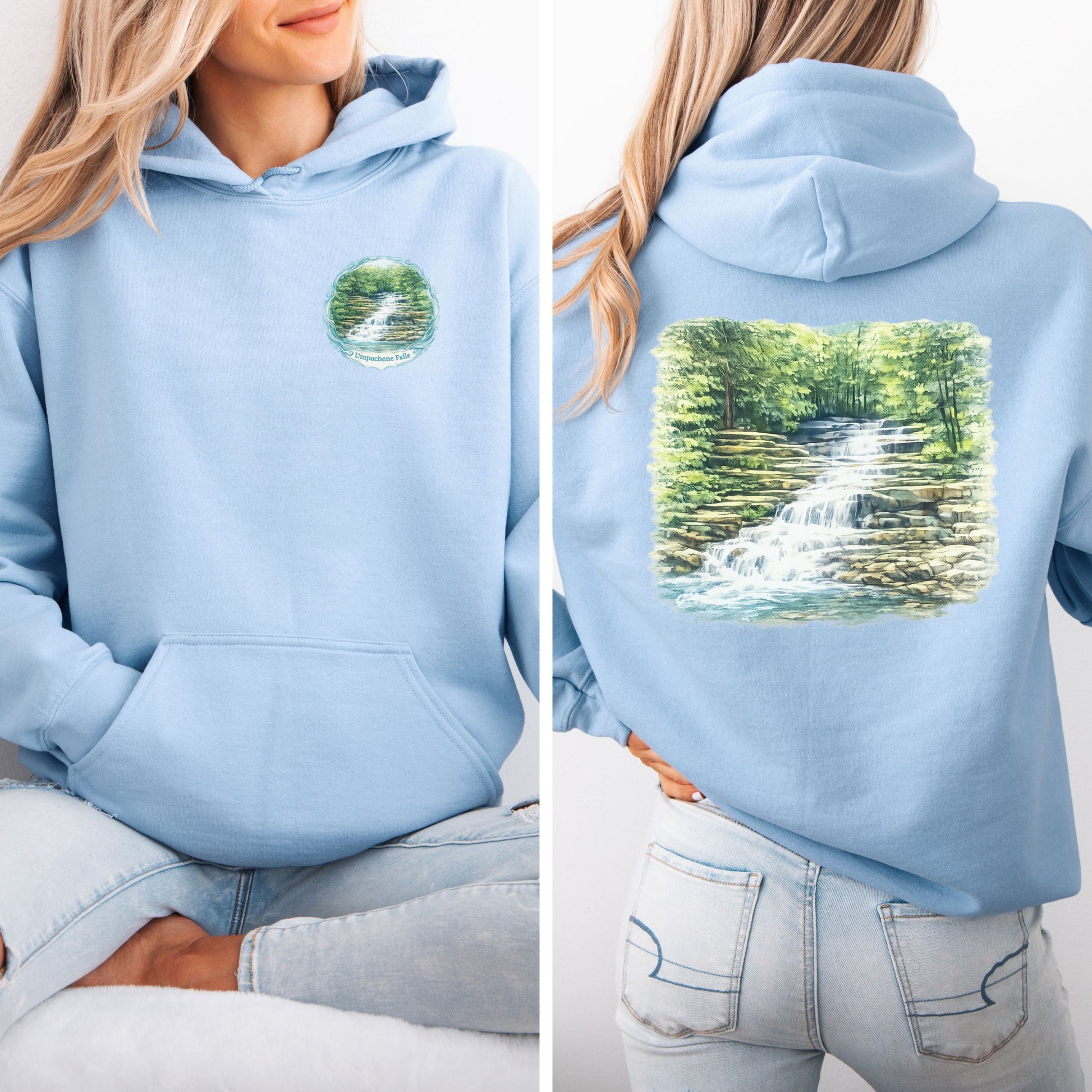 Person wearing light blue hoodie with waterfall logo on front and full waterfall graphic on back