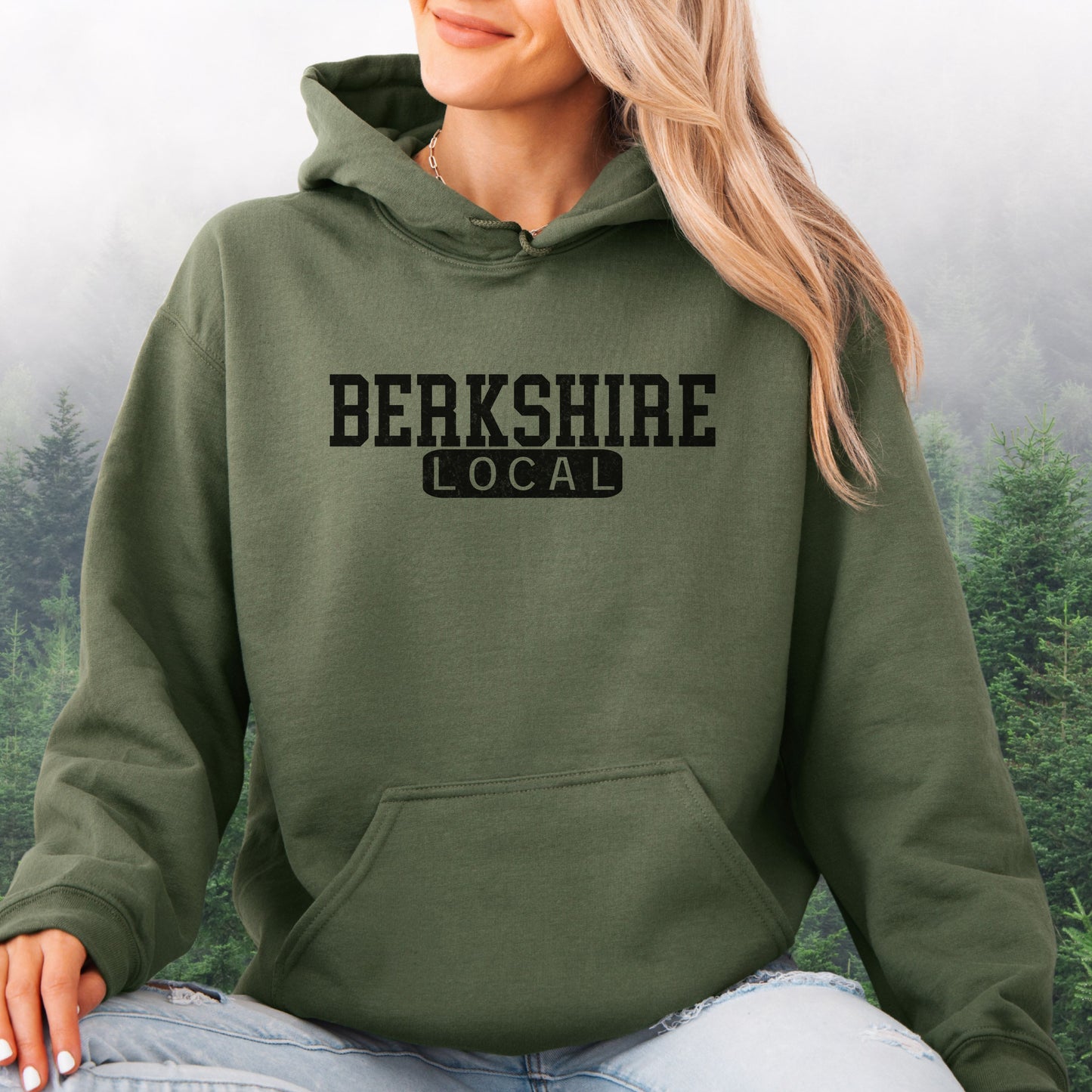 Person wearing Berkshire Local vintage distressed Massachusetts hoodie with collegiate lettering, military green
