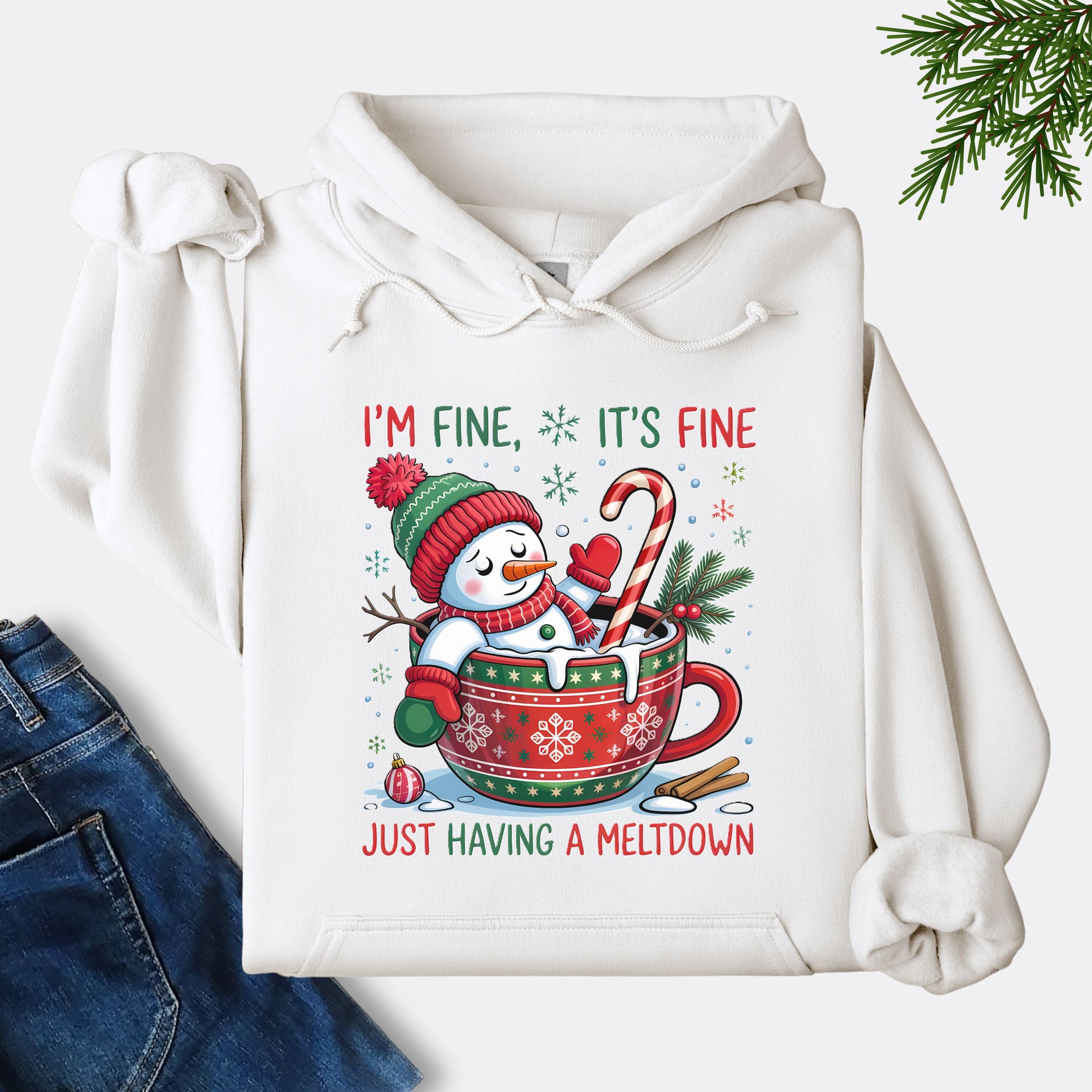 Snowman Christmas hoodie in white with festive mug design and text that reads I’m Fine It’s Fine Just Having a Meltdown.