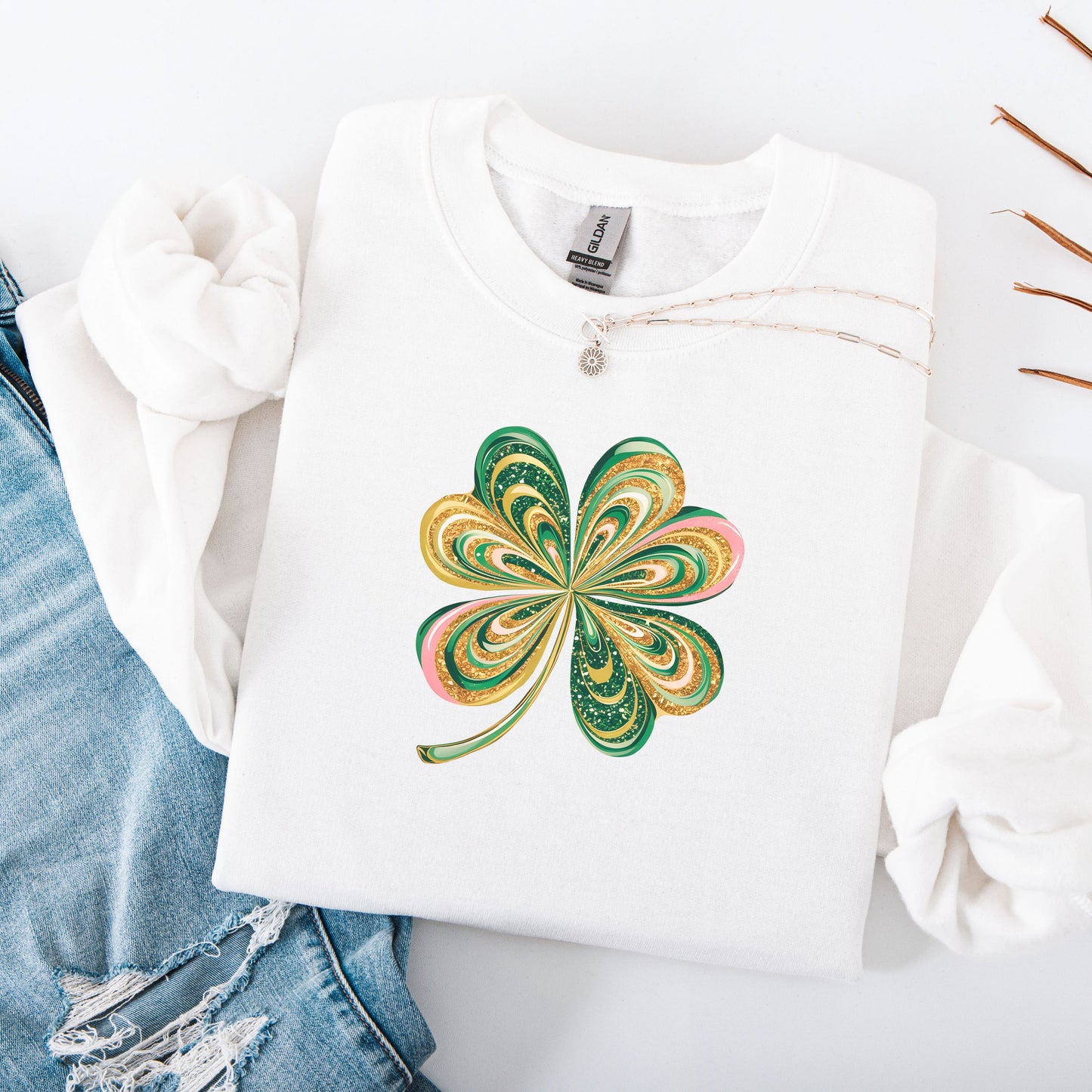 Retro shamrock design on Gildan white sweatshirt flat lay