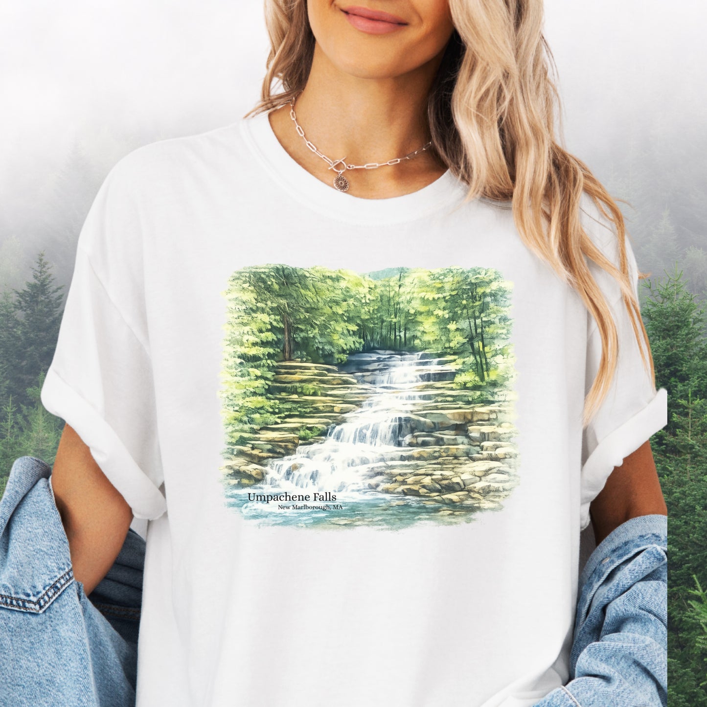 Person wearing Umpachene Falls Comfort Colors t-shirt with waterfall design in white